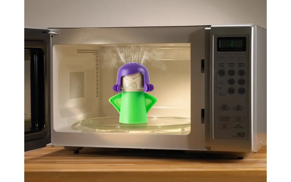 Angry mama cleaning to microwave