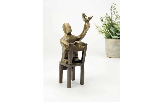 En Fugl I Hånden Bronzeskulptur Gribe Chancen