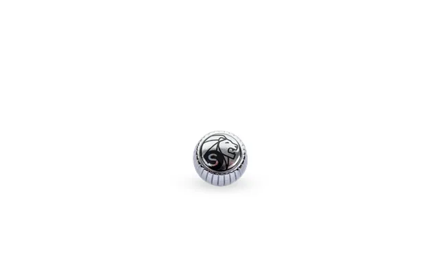 With Its Glossy Chrome Finish And Distinctive Lion's Head - This Peugeot Jewel Button Represents The Brand's Prestige An
